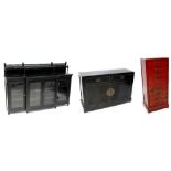 A contemporary black lacquer Oriental-style break-front sideboard/display cabinet,