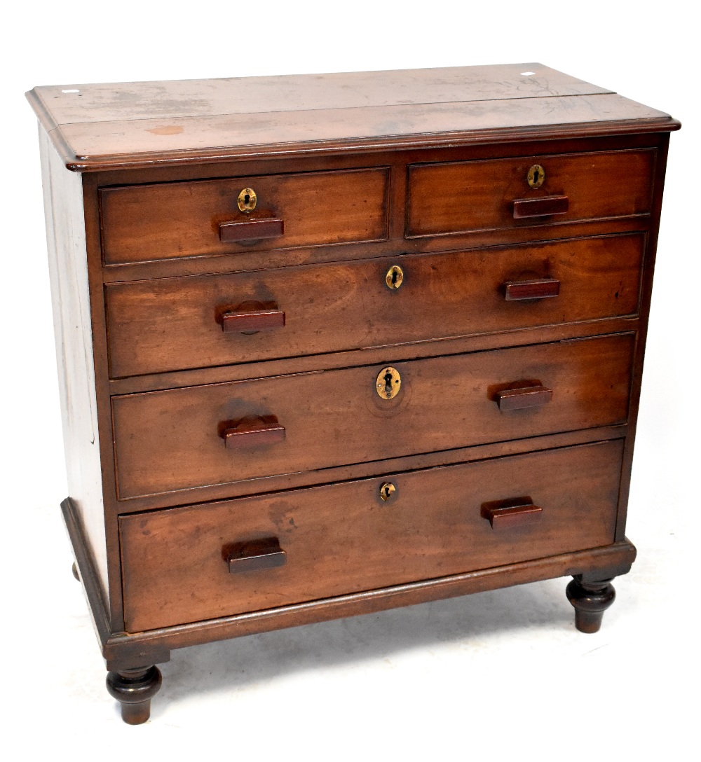 A 19th century mahogany chest of two short over three drawers with later handles, on turned feet,