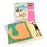 A boxed Sindy stable by Pedigree, also with pail, pony brush and comb, stable brush,