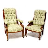 A pair of late Victorian mahogany gentlemen's armchairs with button back and seat,