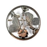 An Arno Malinowski for Georg Jensen silver circular floral brooch.