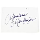A signed card bearing signature 'Marvelous' Marvin Hagler.