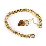A 9ct gold curb link bracelet, stamped 375, with heart-shaped padlock on a safety chain, approx 18g.