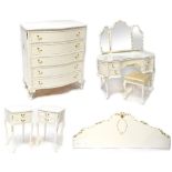 A modern white and gilt bedroom suite in the French style comprising kidney-shaped dressing table
