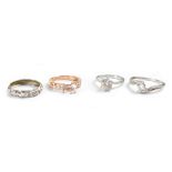 Four ladies' dress rings,