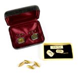 A pair of vintage gold oval cufflinks decorated with all-over floral swirls,