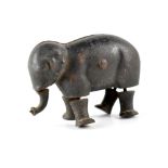 A late 19th Century cast iron walking elephant toy, marked patent 1873,