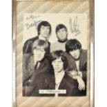 Rolling Stones; a black and white autographed photograph,
