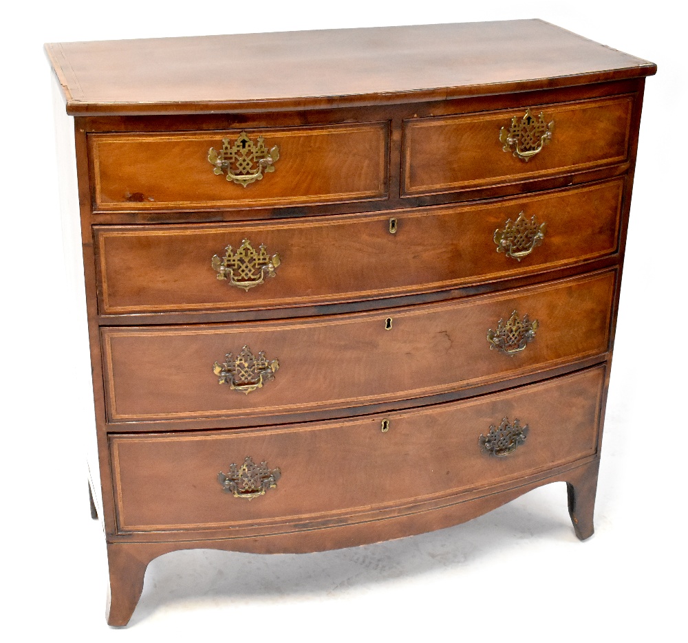 A 19th century inlaid mahogany bow-fronted chest of two short over three long graduated drawers,