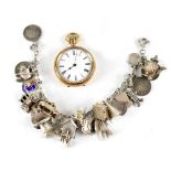 A silver charm bracelet set with twenty-five charms, stamps assay marks and silver, approx 1.