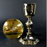 An Elizabeth II hallmarked silver gilt chalice with cherub faces to the column,