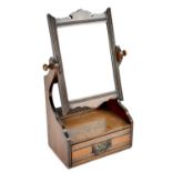 An Edwardian oak swing toilet mirror with rectangular plate above a base with single drawer,