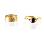 A 9ct gold wedding band, size I, approx 2g,
