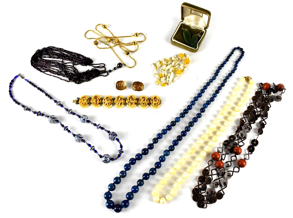 A quantity of costume jewellery to include a blue hardstone graduated bead necklace,