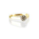 An 18ct gold diamond solitaire ring, the claw-set diamond weighing approx 0.25ct, size M, approx 2.