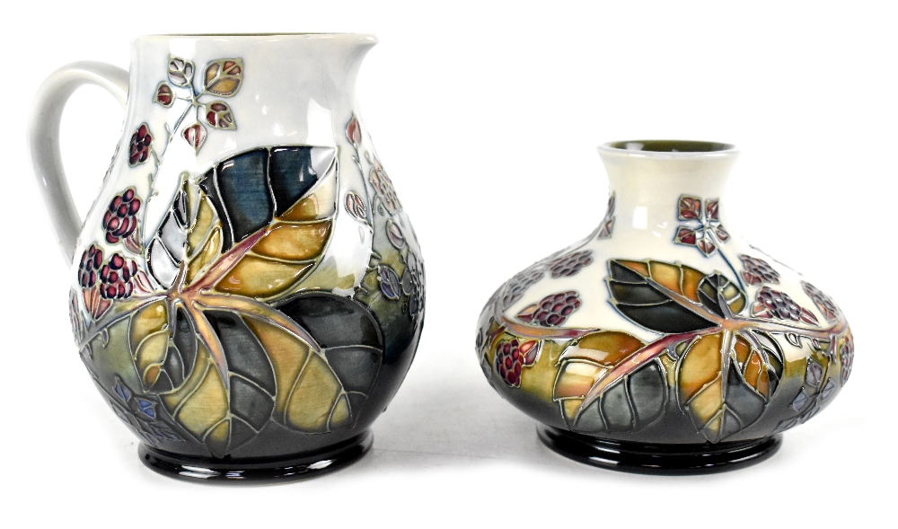 A Moorcroft 'Blackberry' pattern squat vase designed by Sally Tuffin,