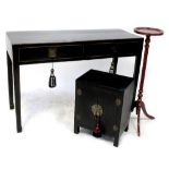 A modern Oriental-style ebonised side/hall table with two frieze drawers,