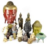 A group of Oriental figures in various media to include metal and ceramic,