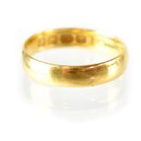 A 22ct yellow gold wedding band, size K, approx 2.9g.