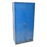 A rustic industrial metal double cabinet,