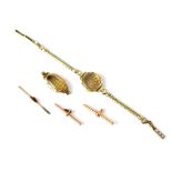 Various items of gold to include an 18ct T-bar, a 9ct T-bar,