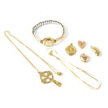 Various items of 9ct gold jewellery to include a Celtic cross suspended on a dainty necklace,