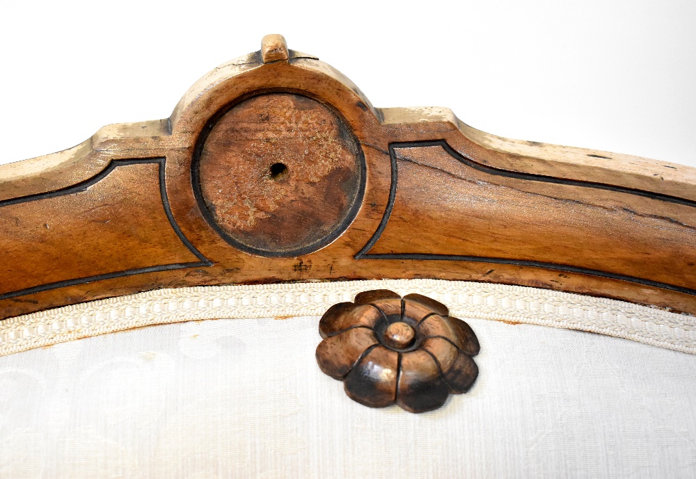 A Victorian walnut spoon back open armchair with scroll ends, upholstered in cream damask, - Image 2 of 3