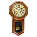 A Victorian American mahogany cased drop-down octagonal eight-day wall clock,