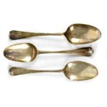 Three George III silver tablespoons, to include one by Nicholas Hearnden, rubbed marks,