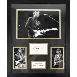 Eric Clapton; a signed framed and glazed montage with three photographs and autograph to the centre,