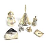 A mixed lot of silver and white metal to include a hallmarked silver pepper pot, Birmingham 1901,