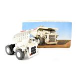 A Conrad 1/50th scale diecast model of a Liebherr KL 2450 The Mining Truck, finished in white,