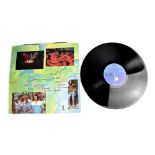 Bob Marley; a signed 12" vinyl record, 'Babylon by Bus', signed to sleeve by Bob Marley,