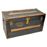 An early 20th century wood bound liner travel trunk with brass name plaque for 'J Mackay',