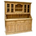 A reproduction pine dresser,