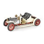 A Mamod live steam Roadster car with white and chrome body, with burner tray, lacking box,