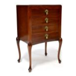 A red walnut four-drawer music cabinet raised on cabriole legs, height 79cm, width 48cm, depth 36cm.