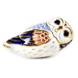 A Royal Crown Derby owl paperweight, with gold stopper, 1988, length 13cm.
