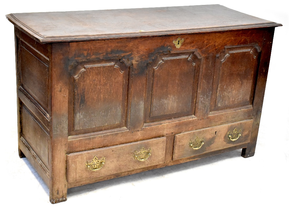 An 18th century oak coffer,