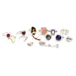 Ten silver ladies' dress rings set with various coloured stones to include amethyst, ruby, pearl,