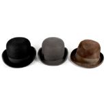 Two bowler hats to include a black Dunne & Co Ltd of London example, size 400 718,