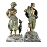 An early 20th century matching pair of large bronze verdigris figures of agricultural workers,