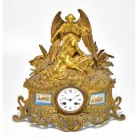 A 19th century French ormolu mantel clock with cast decoration depicting the angel Gabriel above