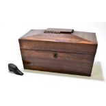 A Victorian rosewood sarcophagus tea caddy, the hinged cover enclosing a matched pressed glass