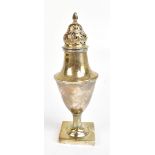 A hallmarked silver sugar caster of baluster form with cast rims, raised on pedestal supports, marks