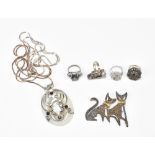 A small group of costume jewellery to include silver dress rings, hard stone oval pendant, etc.