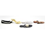 CHANEL; a pair of plastic black flip flops with iconic plastic camellia to the front,  size 40 (af),