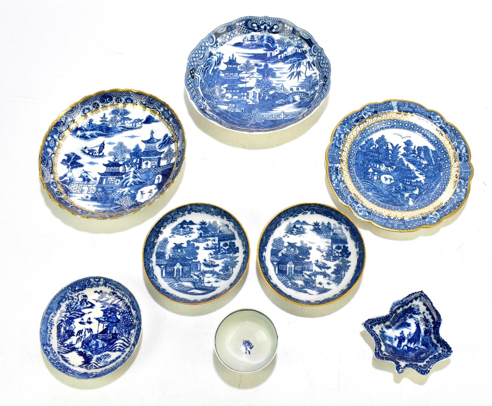 CAUGHLEY; three blue and white printed bowls, each decorated in a variation of the Willow pattern,