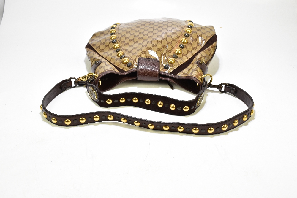 GUCCI; a large monogram cloth handbag with brown suede and leather hand and shoulder straps, - Image 6 of 9