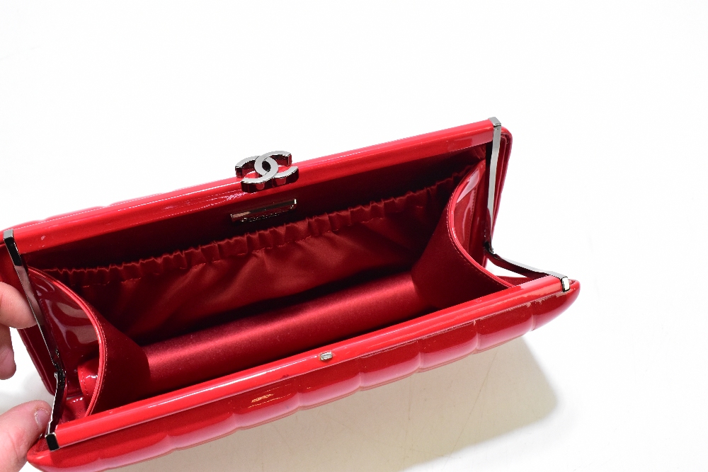 CHANEL; a square quilted kiss lock framed clutch bag in red patent leather with vermilion - Image 5 of 7